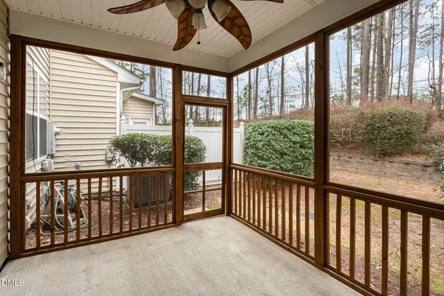 a view of a porch with wooden floor