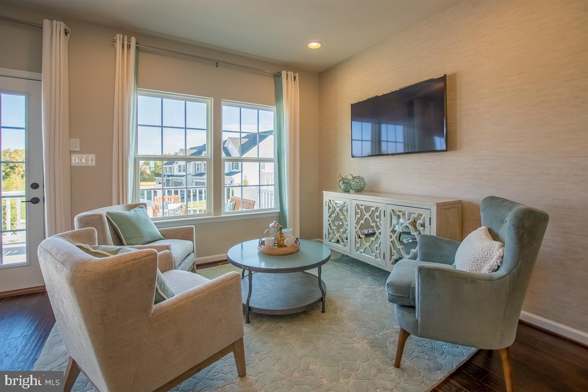 7915 Mine Run Road Hanover, MD 21076 - Photo 11 of 30 a living room with furniture and a large window