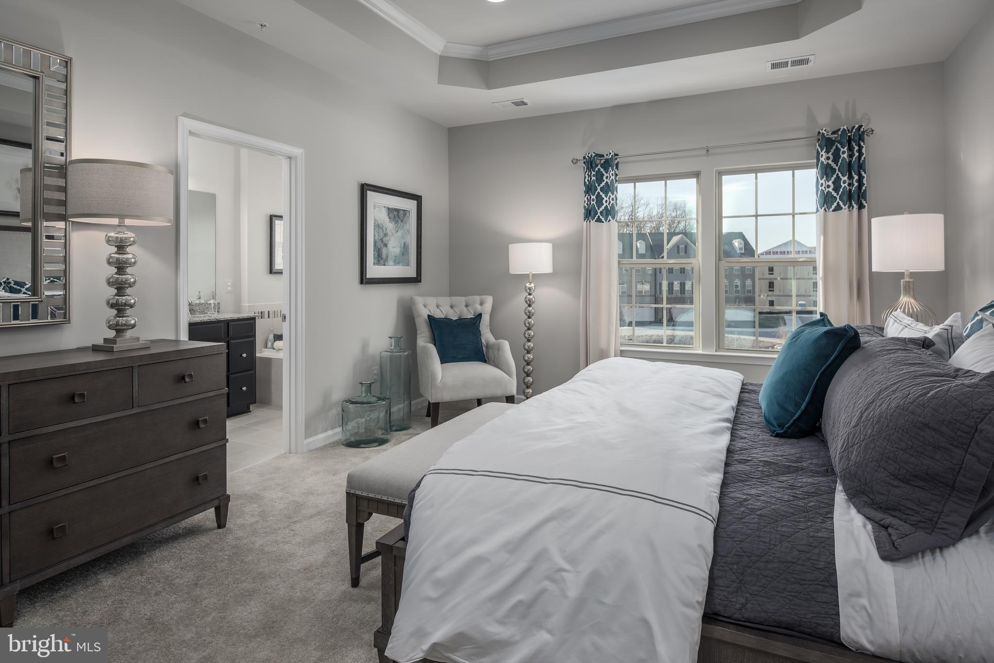 7915 Mine Run Road Hanover, MD 21076 - Photo 13 of 30 a bedroom with a bed and large windows