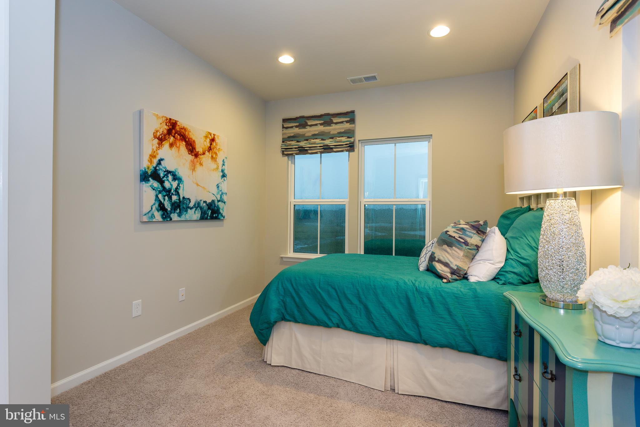 7915 Mine Run Road Hanover, MD 21076 - Photo 16 of 30 a bedroom with a bed and a painting on the wall