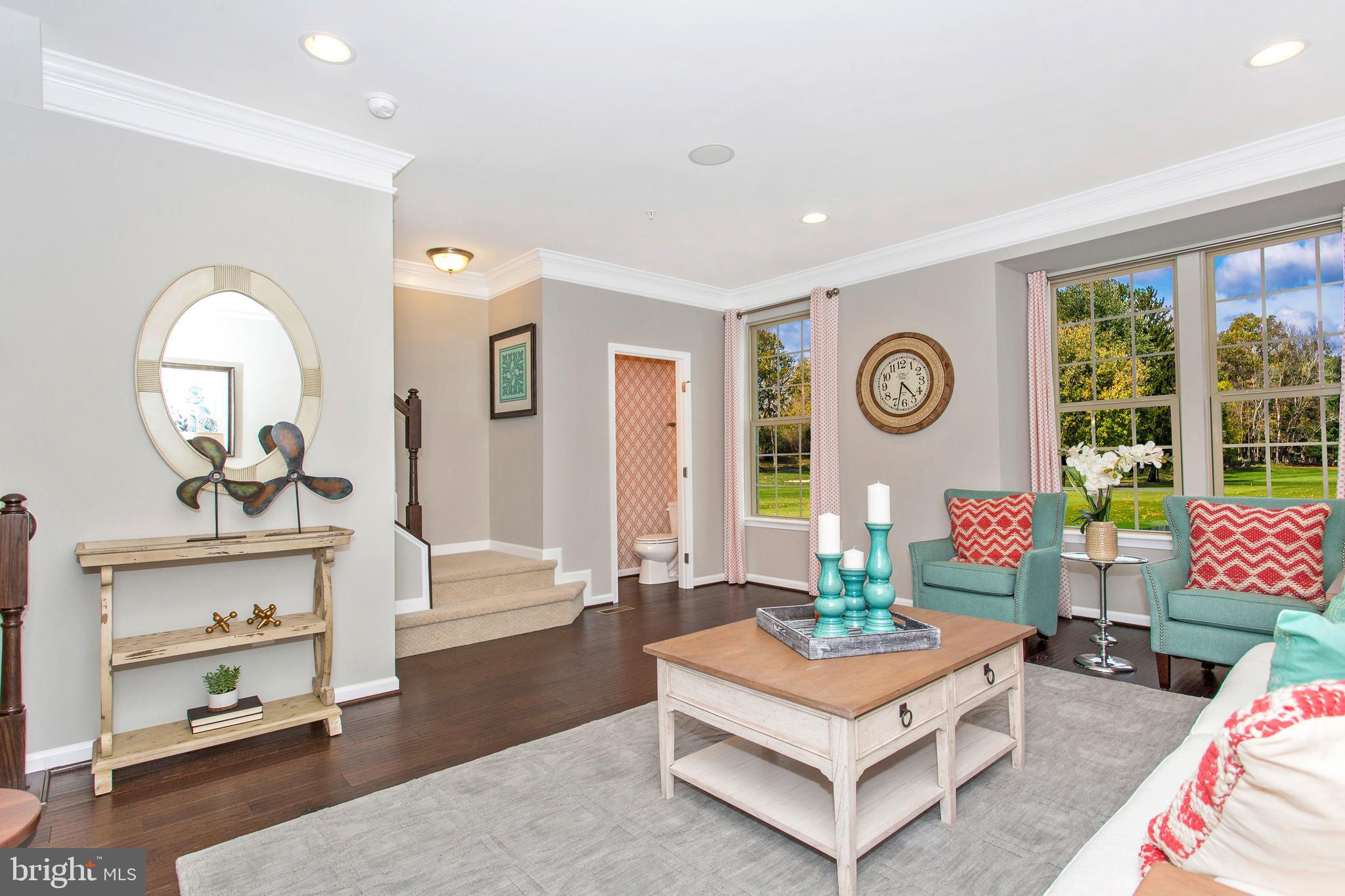 7915 Mine Run Road Hanover, MD 21076 - Photo 30 of 30 a living room with furniture and a table