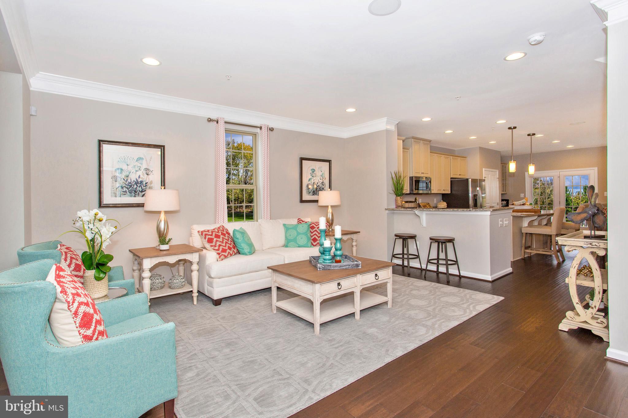 7915 Mine Run Road Hanover, MD 21076 - Photo 7 of 30 a living room with furniture and kitchen view