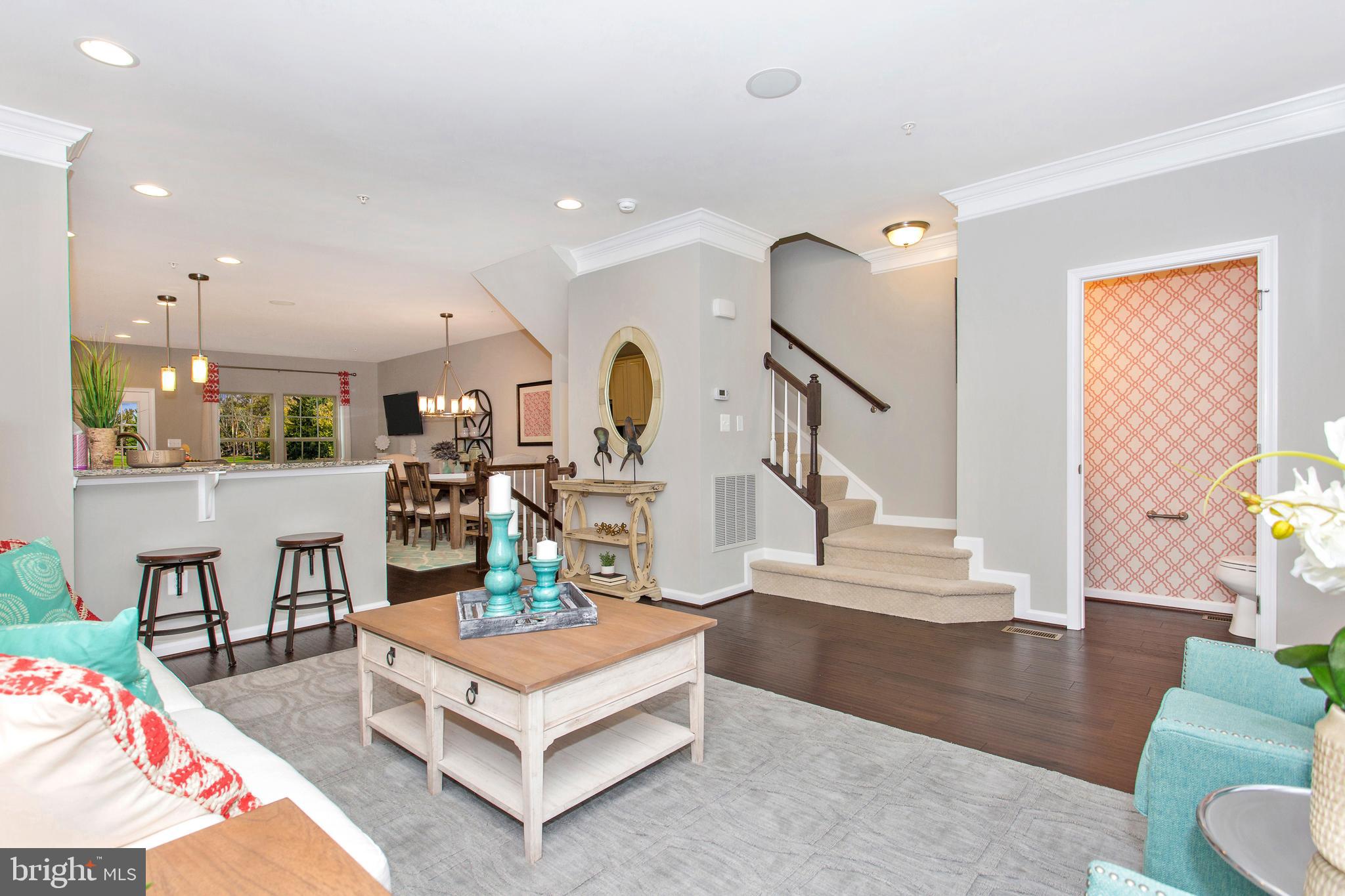 7915 Mine Run Road Hanover, MD 21076 - Photo 8 of 30 a living room with furniture and a wooden floor