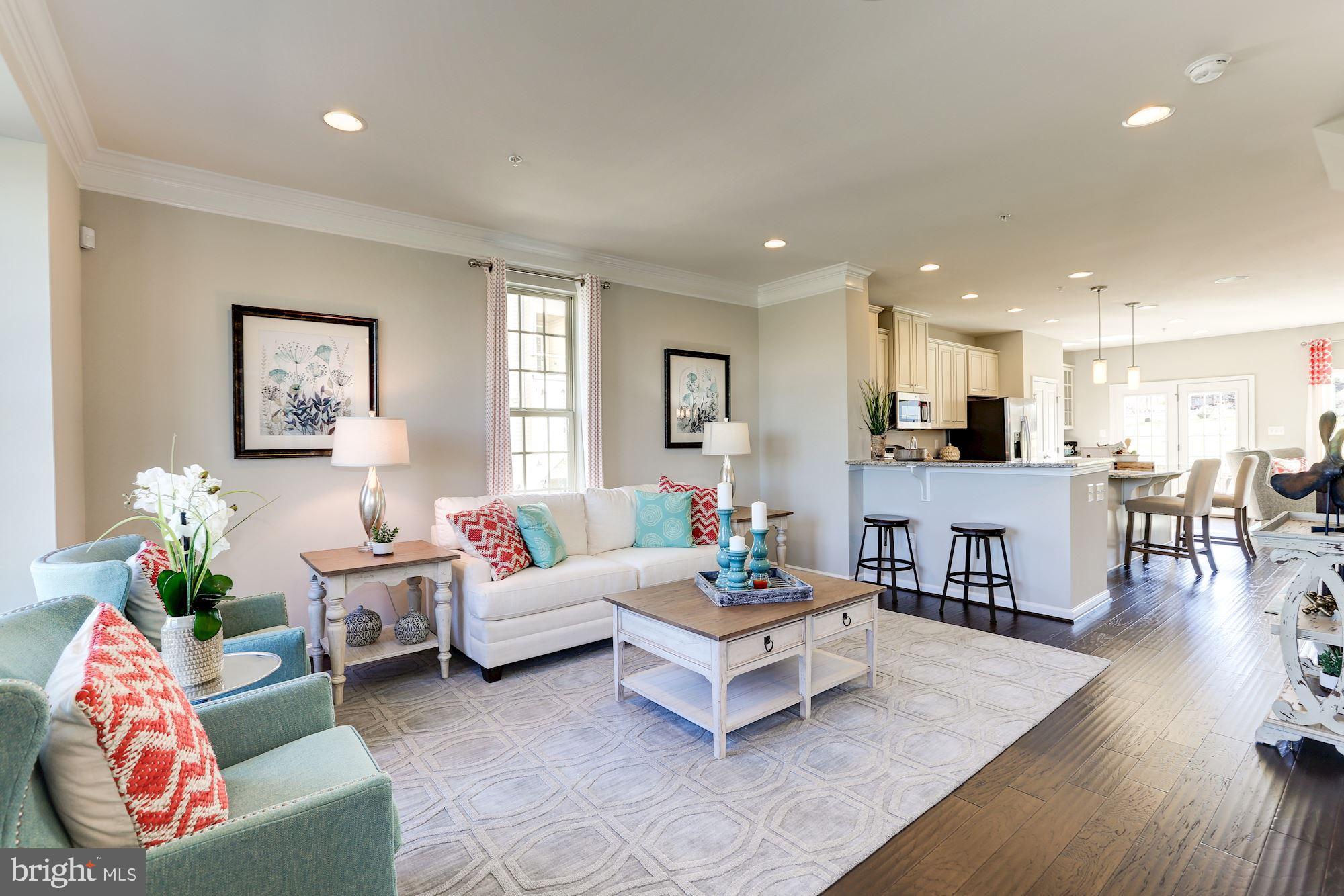 7915 Mine Run Road Hanover, MD 21076 - Photo 9 of 30 a living room with furniture and wooden floor