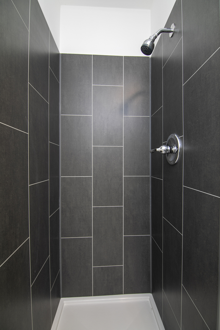 22 Erin Lane Kankakee, IL 60901 - Photo 22 of 45 a bathroom with a shower