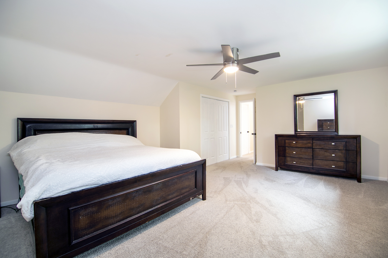 22 Erin Lane Kankakee, IL 60901 - Photo 27 of 45 a bedroom with a bed and a ceiling fan
