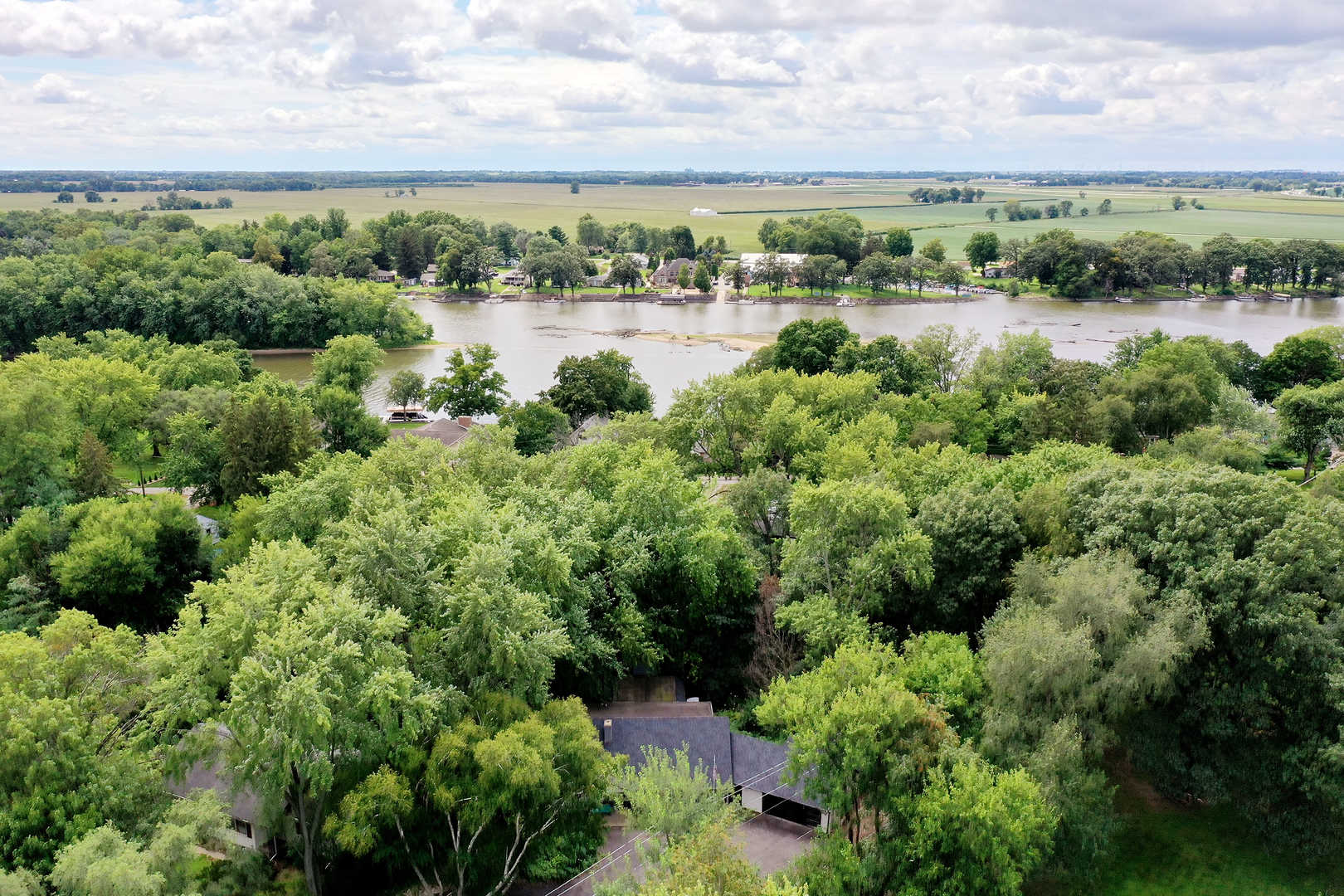 22 Erin Lane Kankakee, IL 60901 - Photo 4 of 45 a view of a lake with houses in the back