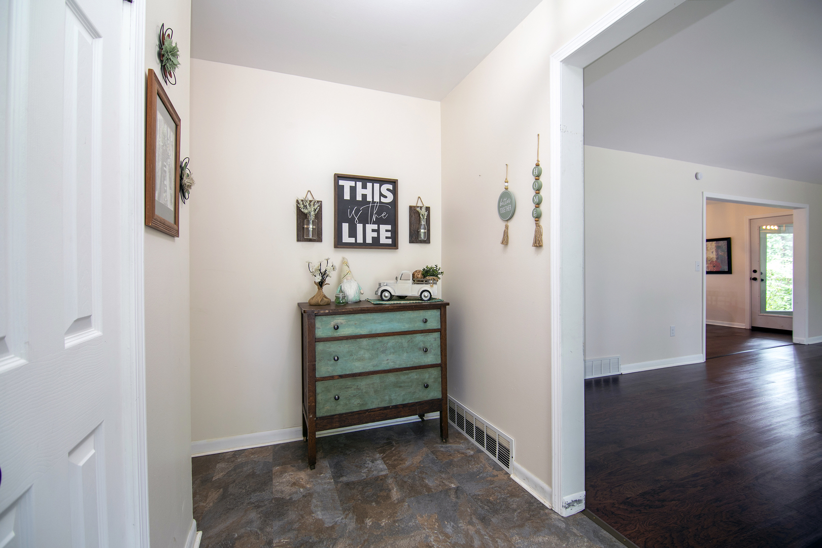 22 Erin Lane Kankakee, IL 60901 - Photo 8 of 45 a view of room with window and wooden floor