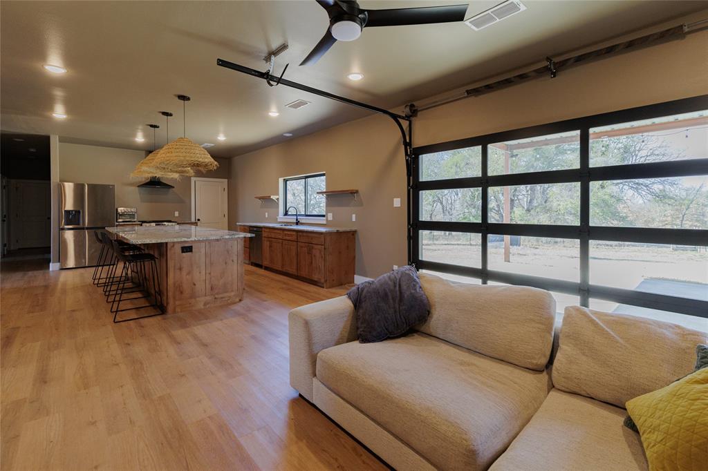 500 County Road 2745 Decatur, TX 76234 - Photo 13 of 38 a living room with furniture and a wooden floor