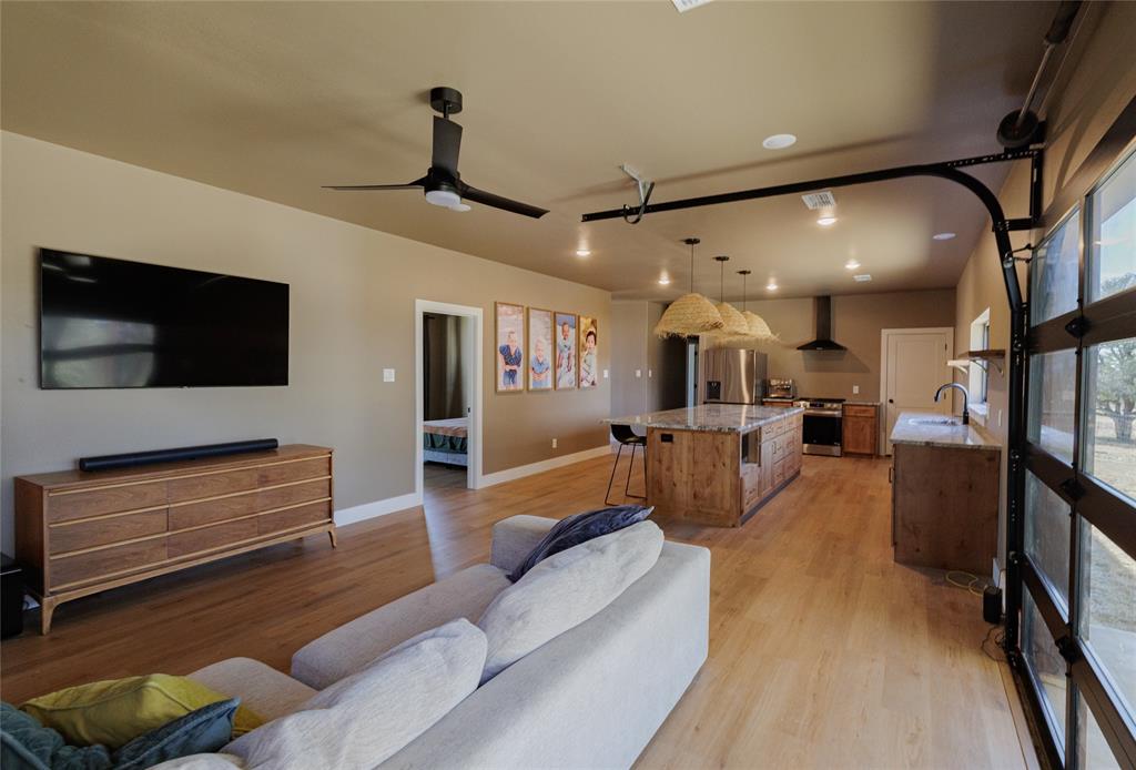 500 County Road 2745 Decatur, TX 76234 - Photo 14 of 38 a living room with furniture and a flat screen tv