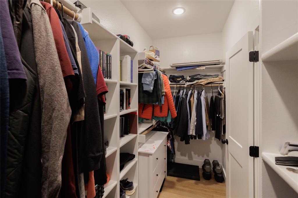 500 County Road 2745 Decatur, TX 76234 - Photo 21 of 38 a view of walk in closet with clothes and shoes