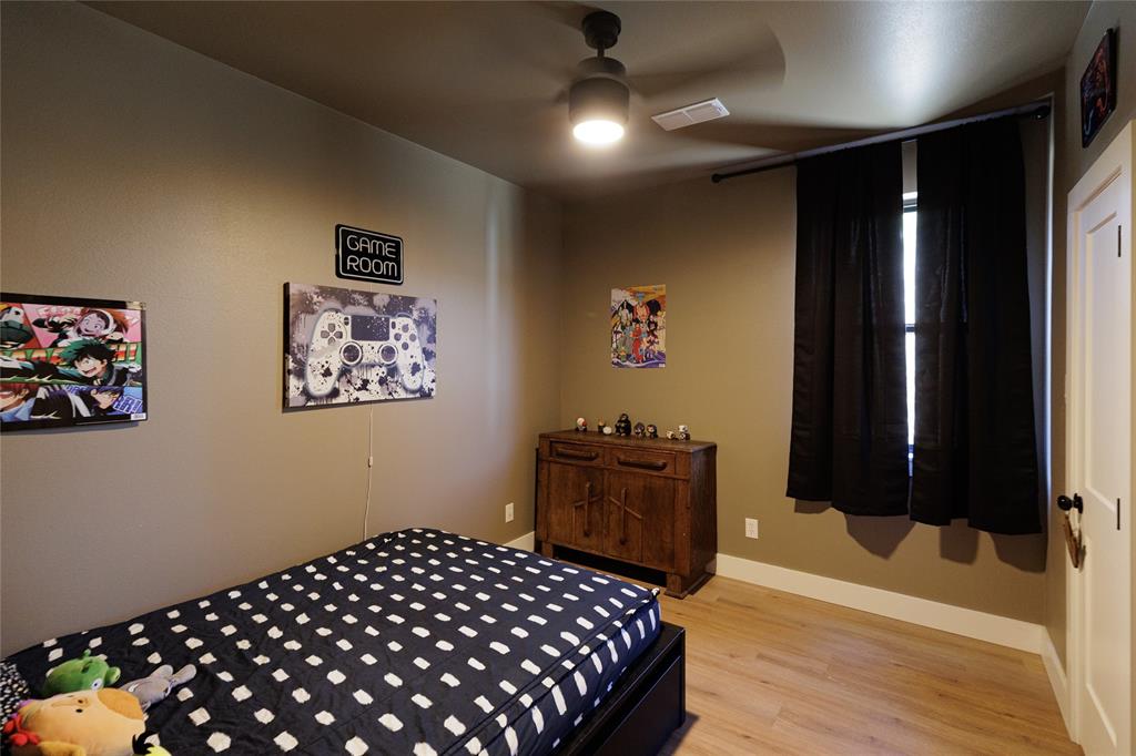 500 County Road 2745 Decatur, TX 76234 - Photo 26 of 38 a bedroom with bed and a window