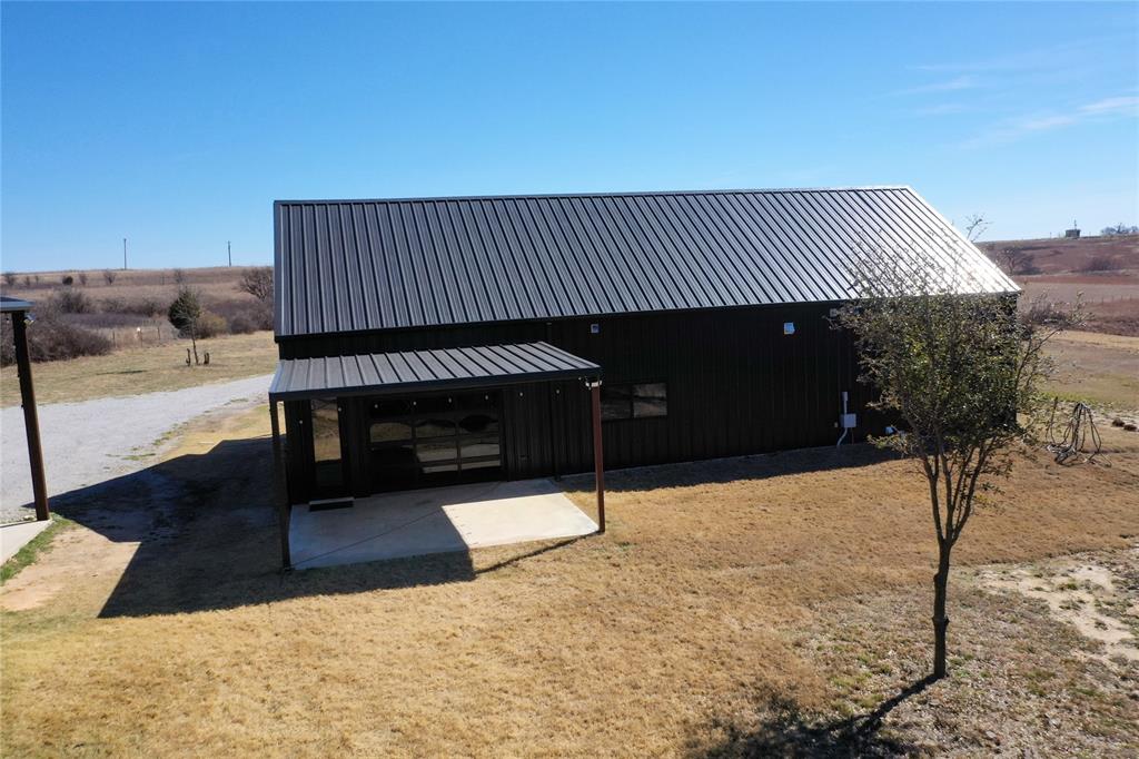 500 County Road 2745 Decatur, TX 76234 - Photo 35 of 38 a terrace with a bench