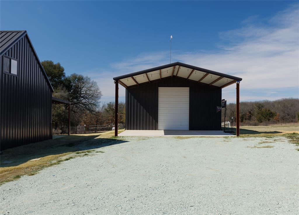 500 County Road 2745 Decatur, TX 76234 - Photo 6 of 38 a front view of a house with a yard