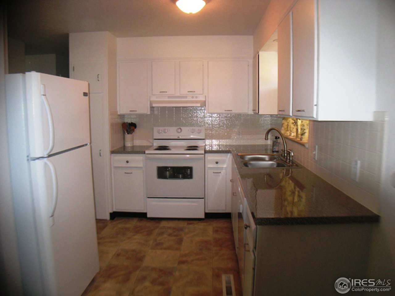 3314 West 5th St Road Greeley, CO 80634 - Photo 4 of 15 Completely remodeled kitchen