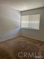 915 South Ridgecrest Circle Anaheim, CA 92807 - Photo 14 of 21 en empty room with window