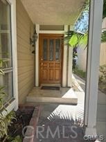 915 South Ridgecrest Circle Anaheim, CA 92807 - Photo 3 of 21 a view of entrance door of the house