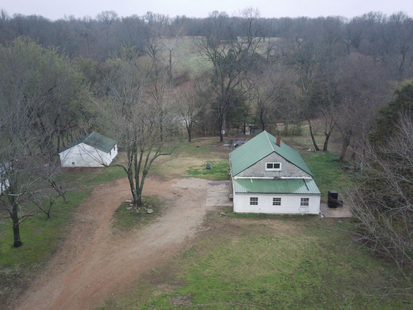 3612 Bunch Road Anderson, MO 64831 - Photo 1 of 1 Historic Limestone with metal roof