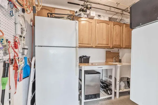 a view of a storage & utility room with washer and dryer