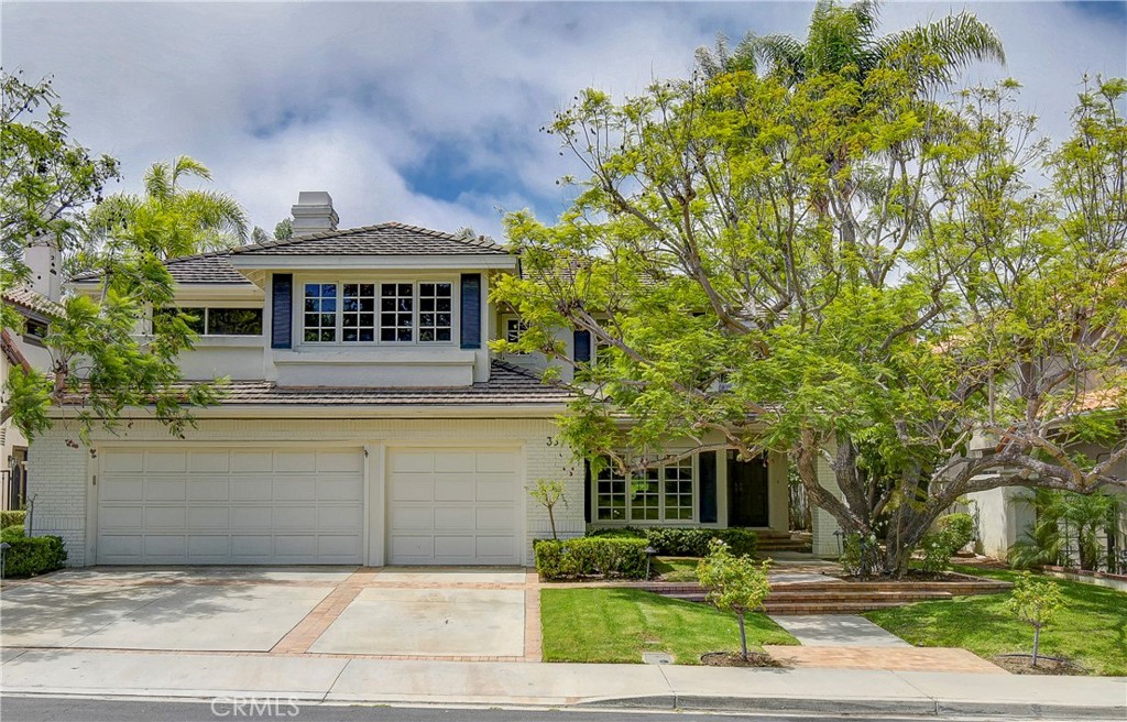 33 Hastings Laguna Niguel, CA 92677 - Photo 1 of 17 a front view of a house with garden