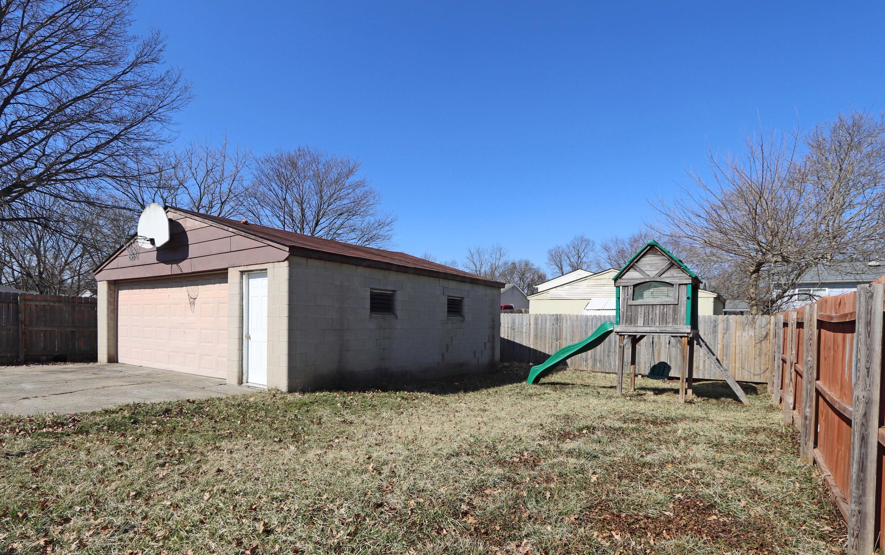 4569 Stonehedge Road Columbus, OH 43231 - Photo 36 of 38 Large lawn area with playset