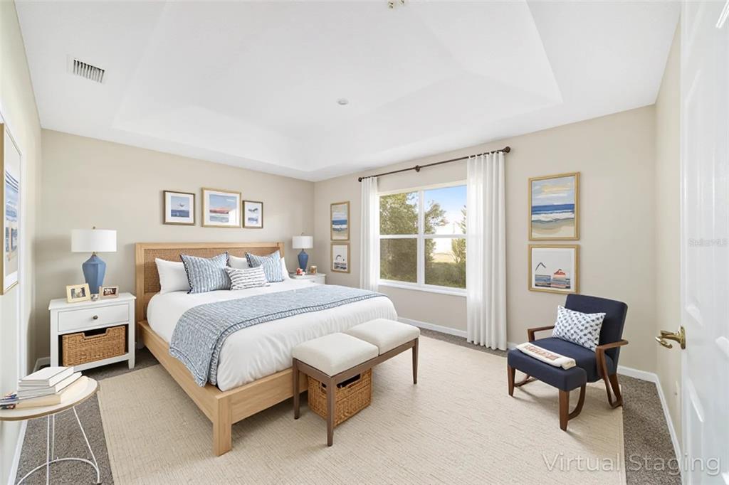 6241 Southwest 84th Place Ocala, FL 34476 - Photo 15 of 33 a bedroom with a bed chair and a window