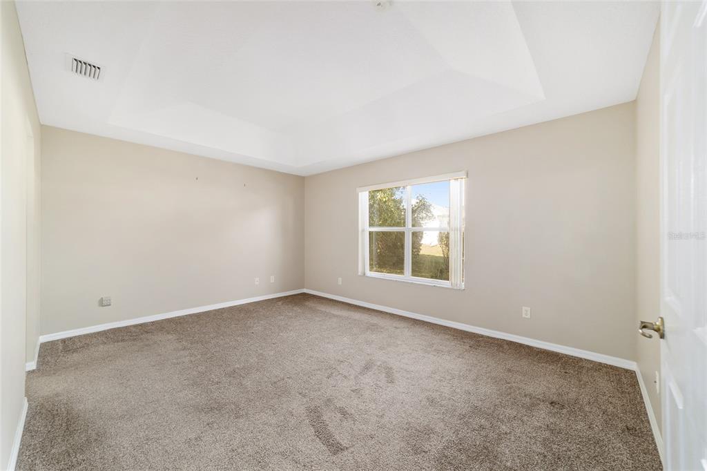 6241 Southwest 84th Place Ocala, FL 34476 - Photo 16 of 33 an empty room with windows