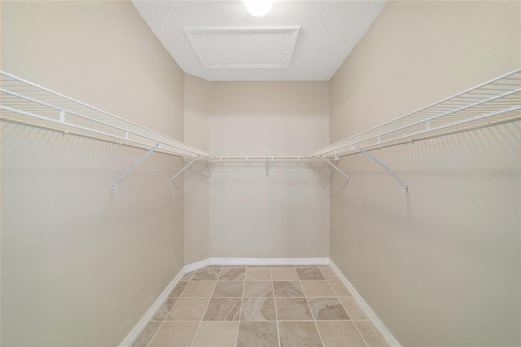 6241 Southwest 84th Place Ocala, FL 34476 - Photo 17 of 33 a view of a room with racks on the wall