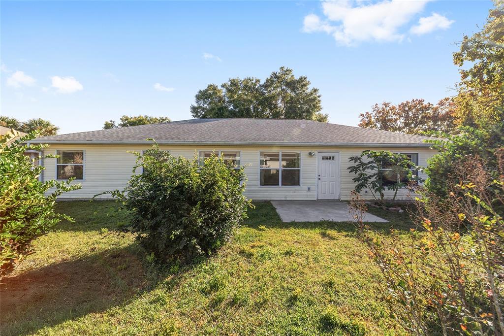 6241 Southwest 84th Place Ocala, FL 34476 - Photo 27 of 33 a view of a house with a yard