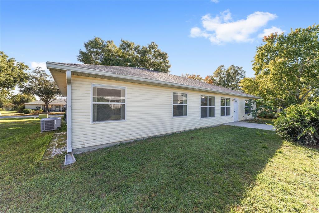6241 Southwest 84th Place Ocala, FL 34476 - Photo 28 of 33 a view of a house with a backyard