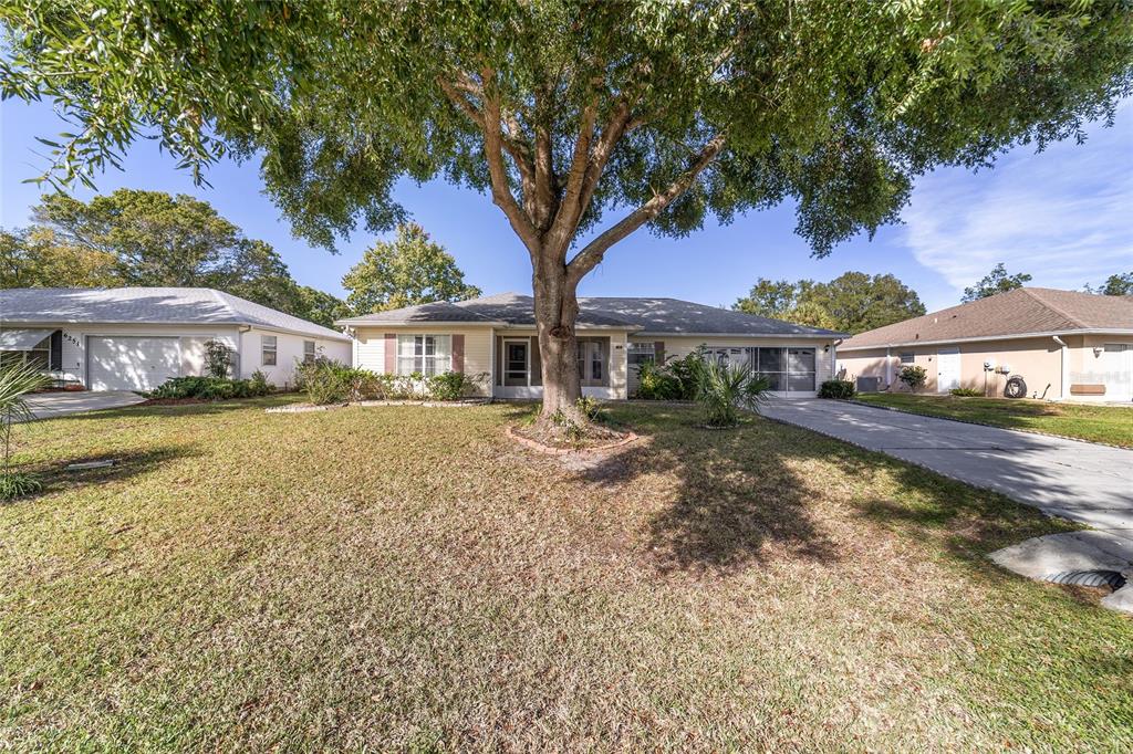 6241 Southwest 84th Place Ocala, FL 34476 - Photo 30 of 33 a view of house with outdoor space and swimming pool