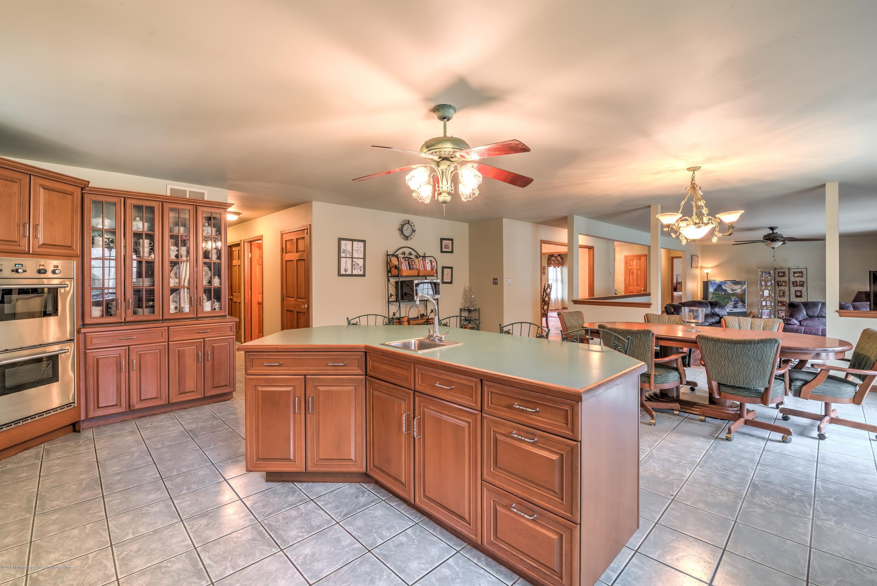 20 Hornerstown Road Cream Ridge, NJ 08514 - Photo 12 of 28 a kitchen with a sink and cabinets
