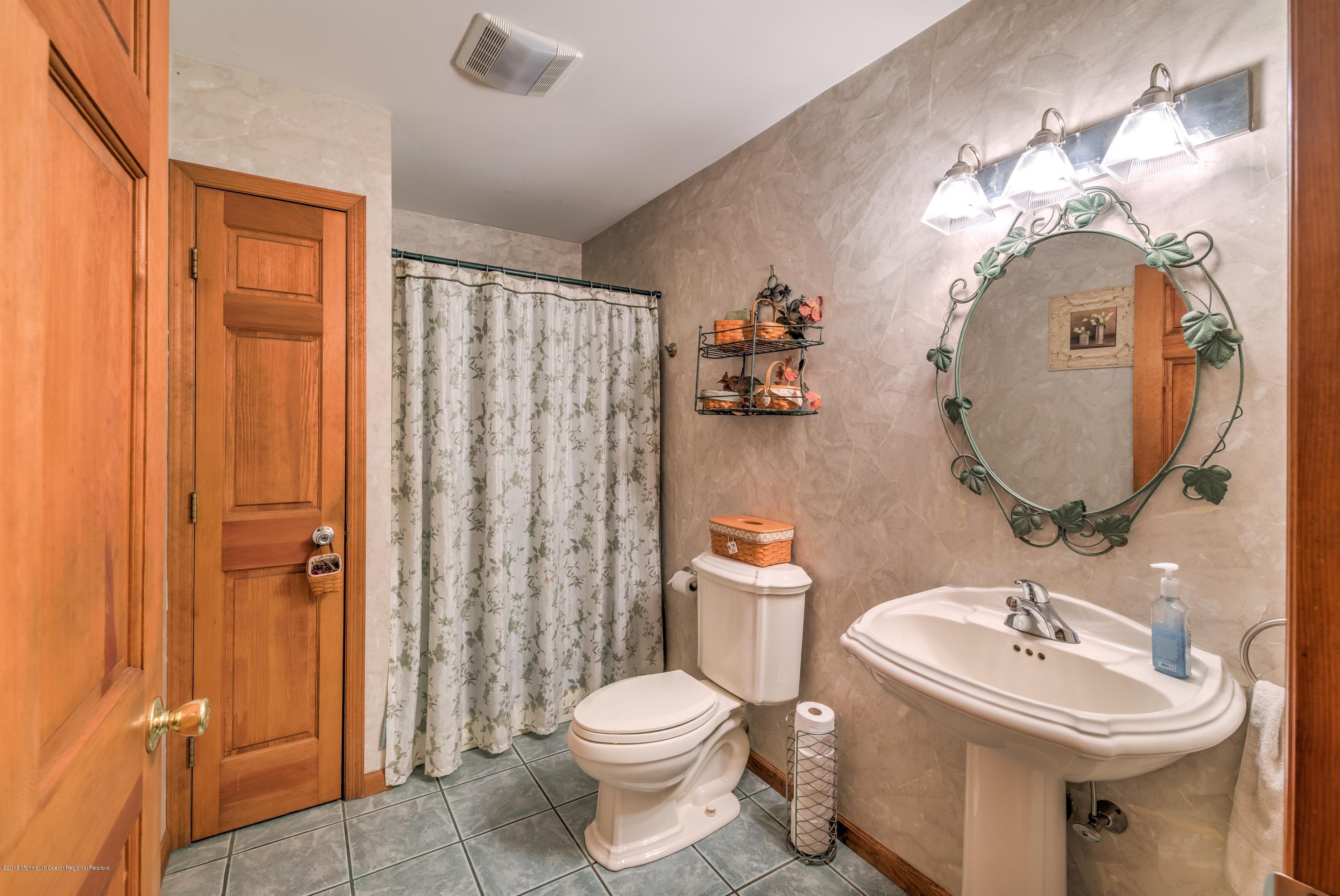 20 Hornerstown Road Cream Ridge, NJ 08514 - Photo 14 of 28 a bathroom with a sink toilet and shower