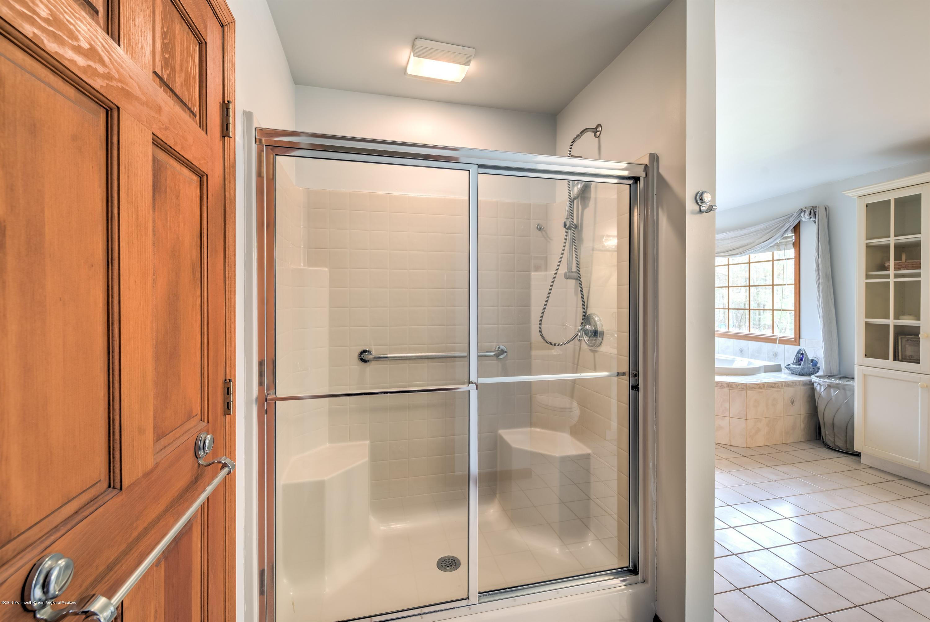 20 Hornerstown Road Cream Ridge, NJ 08514 - Photo 17 of 28 a bathroom with a glass shower door