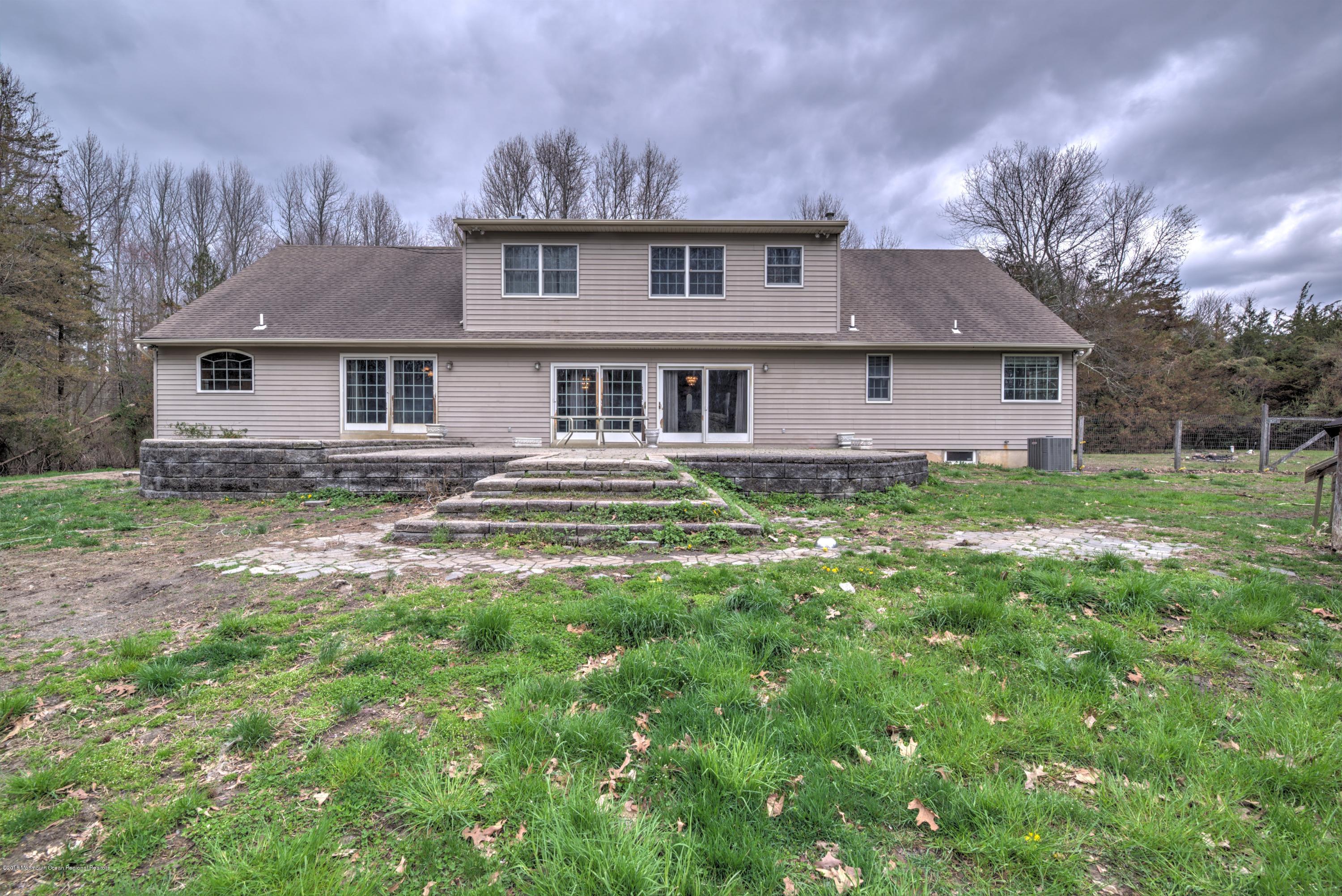 20 Hornerstown Road Cream Ridge, NJ 08514 - Photo 27 of 28 front view of house with a yard