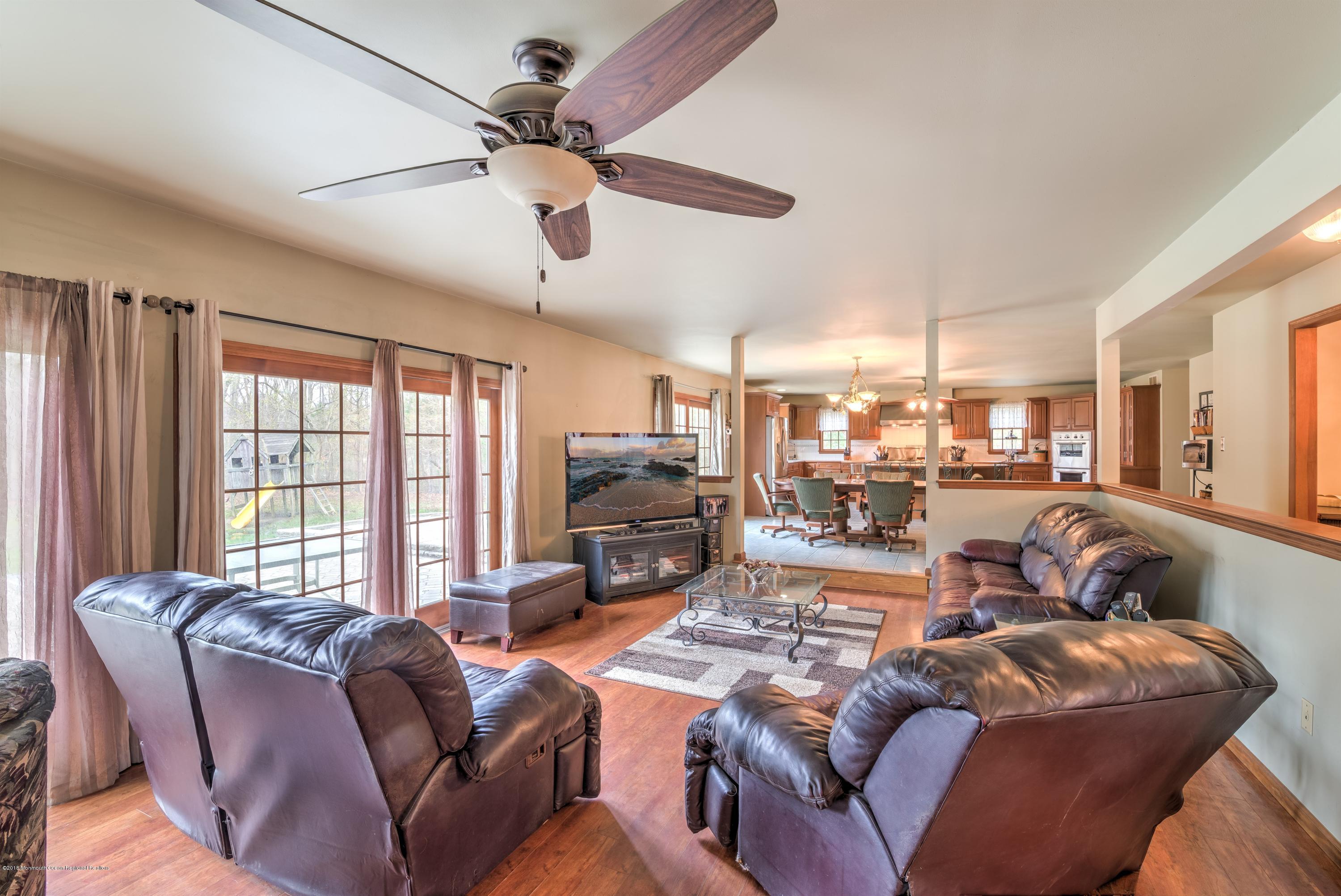 20 Hornerstown Road Cream Ridge, NJ 08514 - Photo 5 of 28 a living room with furniture kitchen view and a large window
