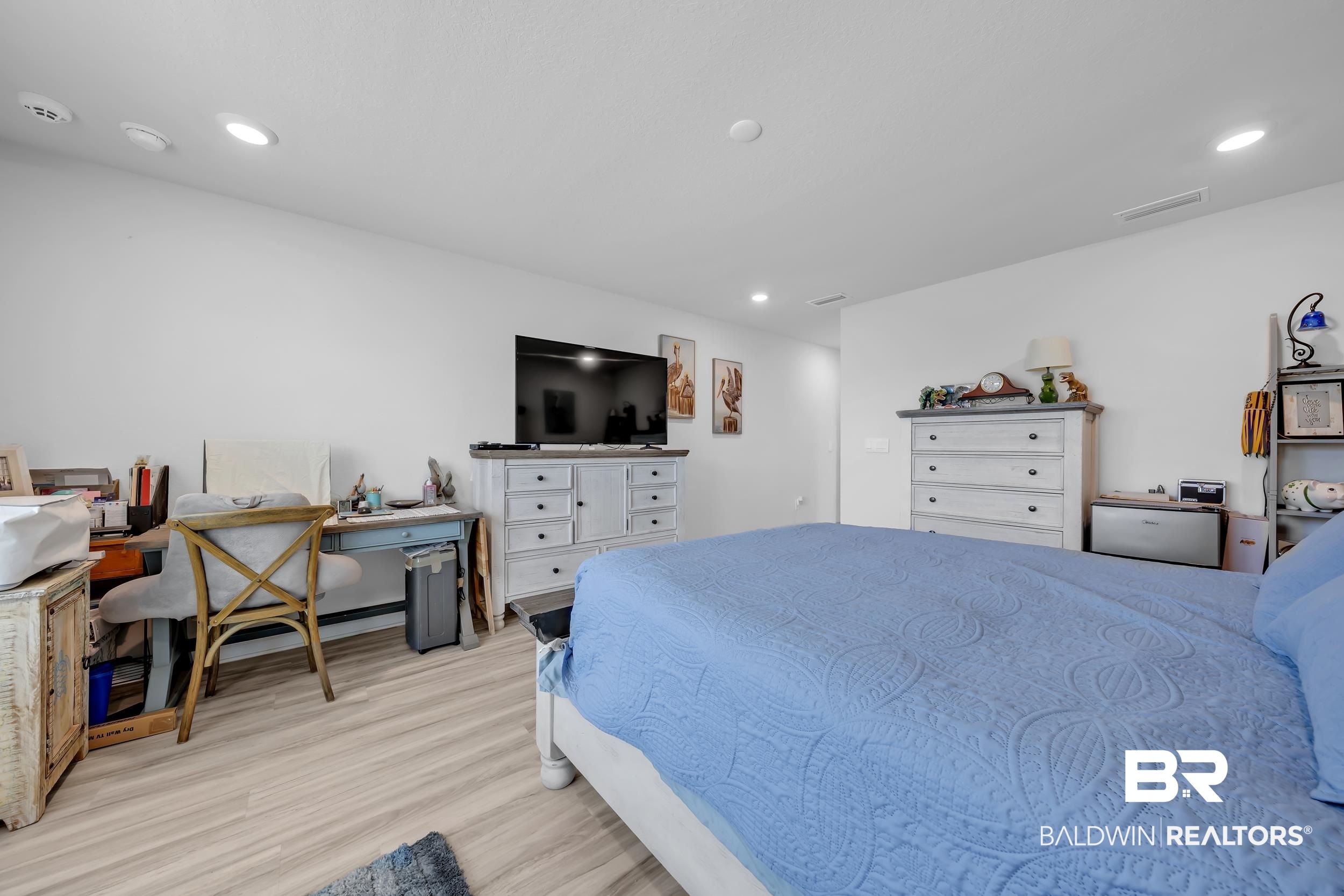 24271 Ringneck Loop Elberta, AL 36530 - Photo 22 of 44 Bright interior space featuring light wood-finish flooring, recessed lighting, and white walls