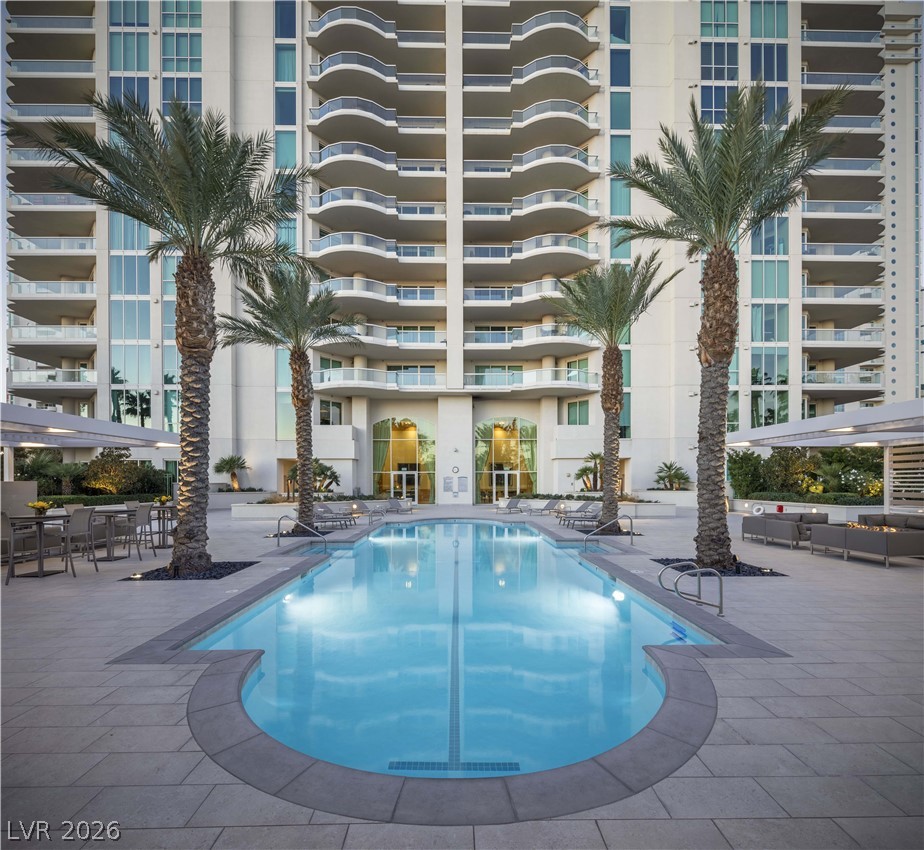 2777 Paradise Road, Unit 807 Las Vegas, NV 89109 - Photo 60 of 61 A glimmering pool and ample outdoor seating provide a refreshing urban oasis.