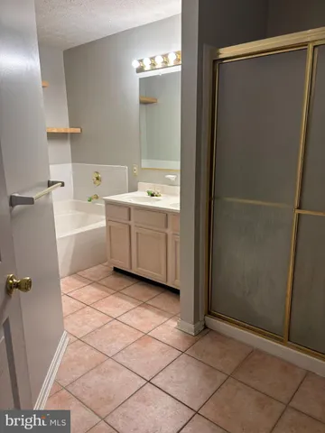 a view of a bathroom with mirror