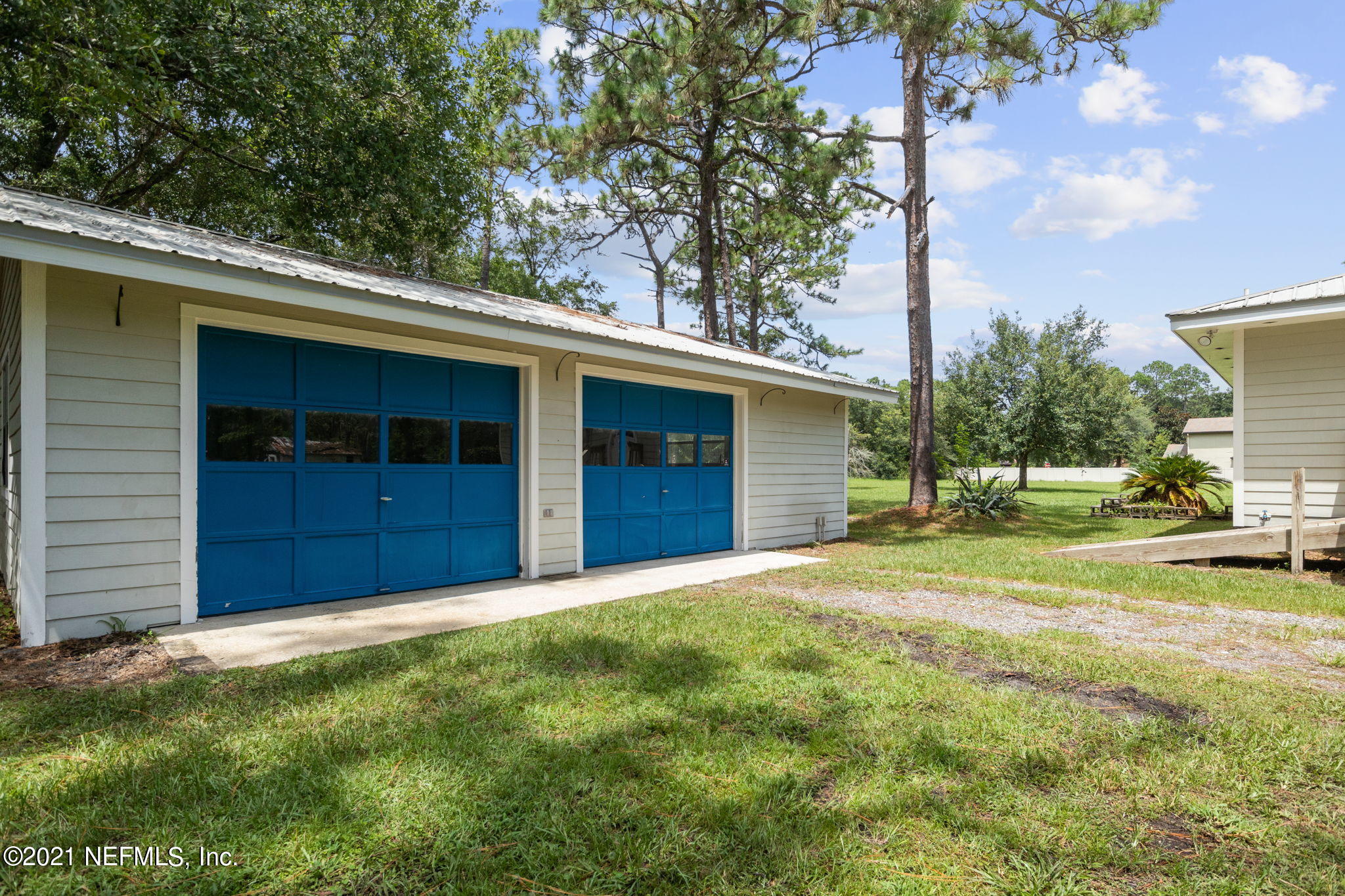 4730 Ricker Road Jacksonville, FL 32210 - Photo 8 of 30 a view of a backyard of the house