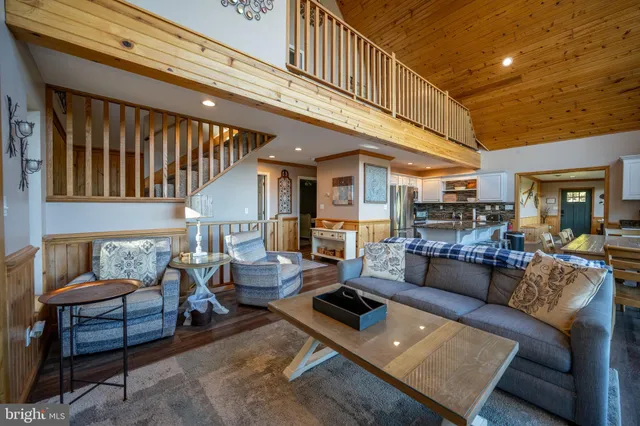 a bed room with a bed and a chair