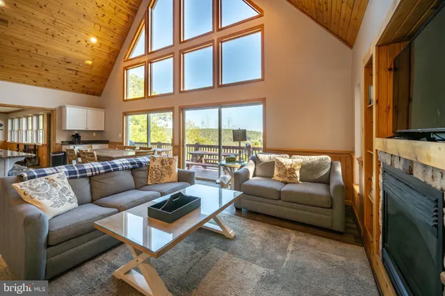 a balcony with table and chairs