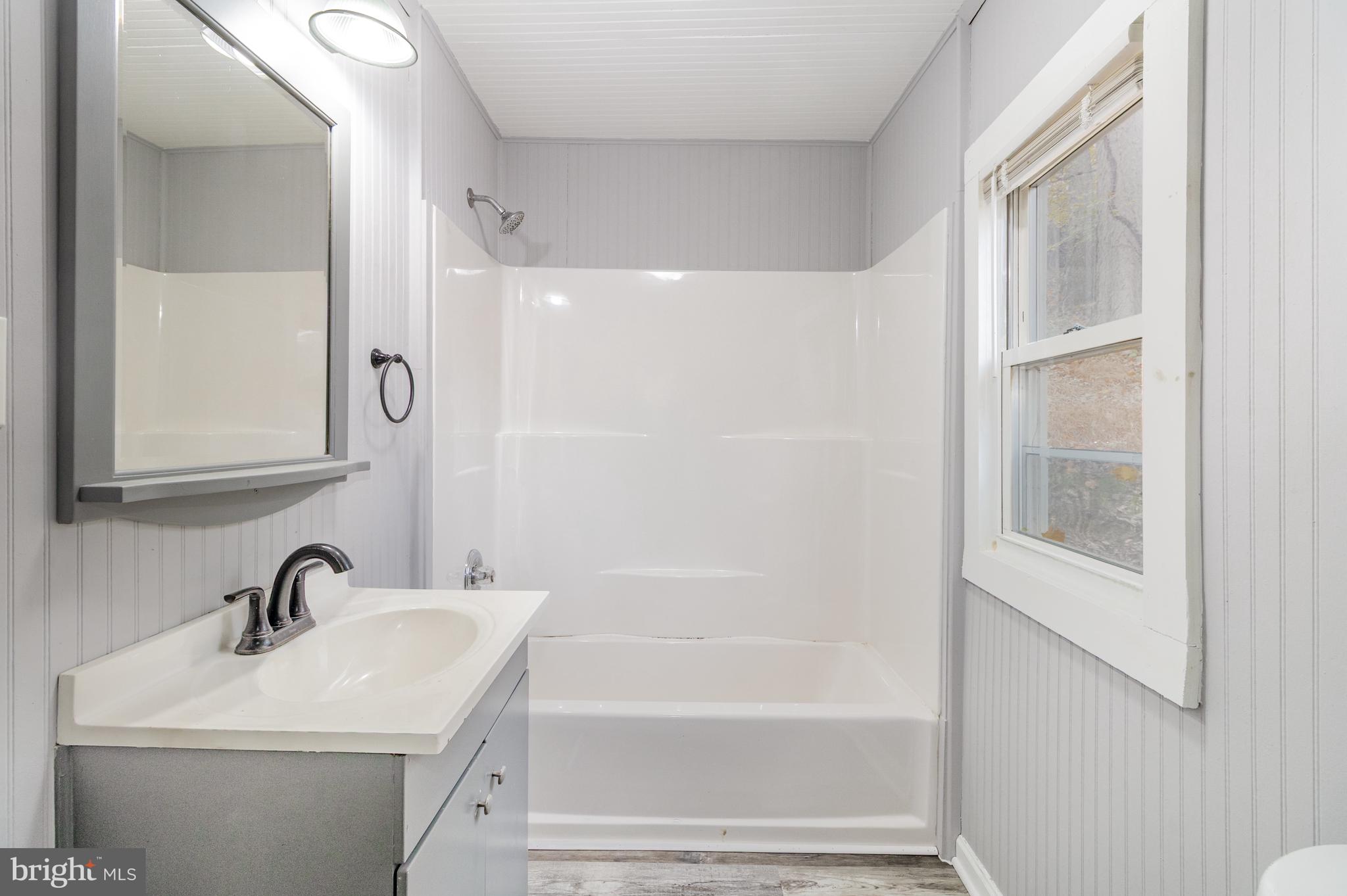 650 Mohn Street Harrisburg, PA 17113 - Photo 15 of 29 a bathroom with a sink and a mirror