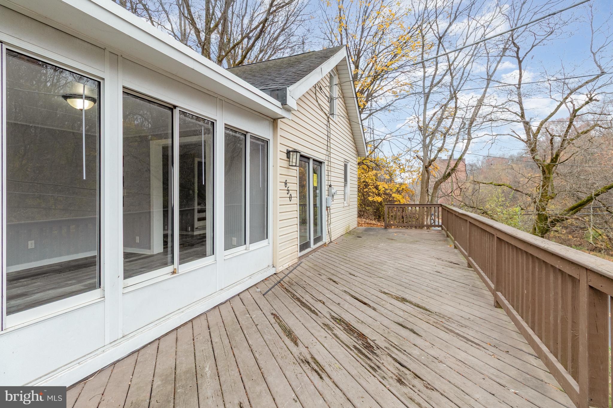 650 Mohn Street Harrisburg, PA 17113 - Photo 21 of 29 a view of a house with a wooden deck