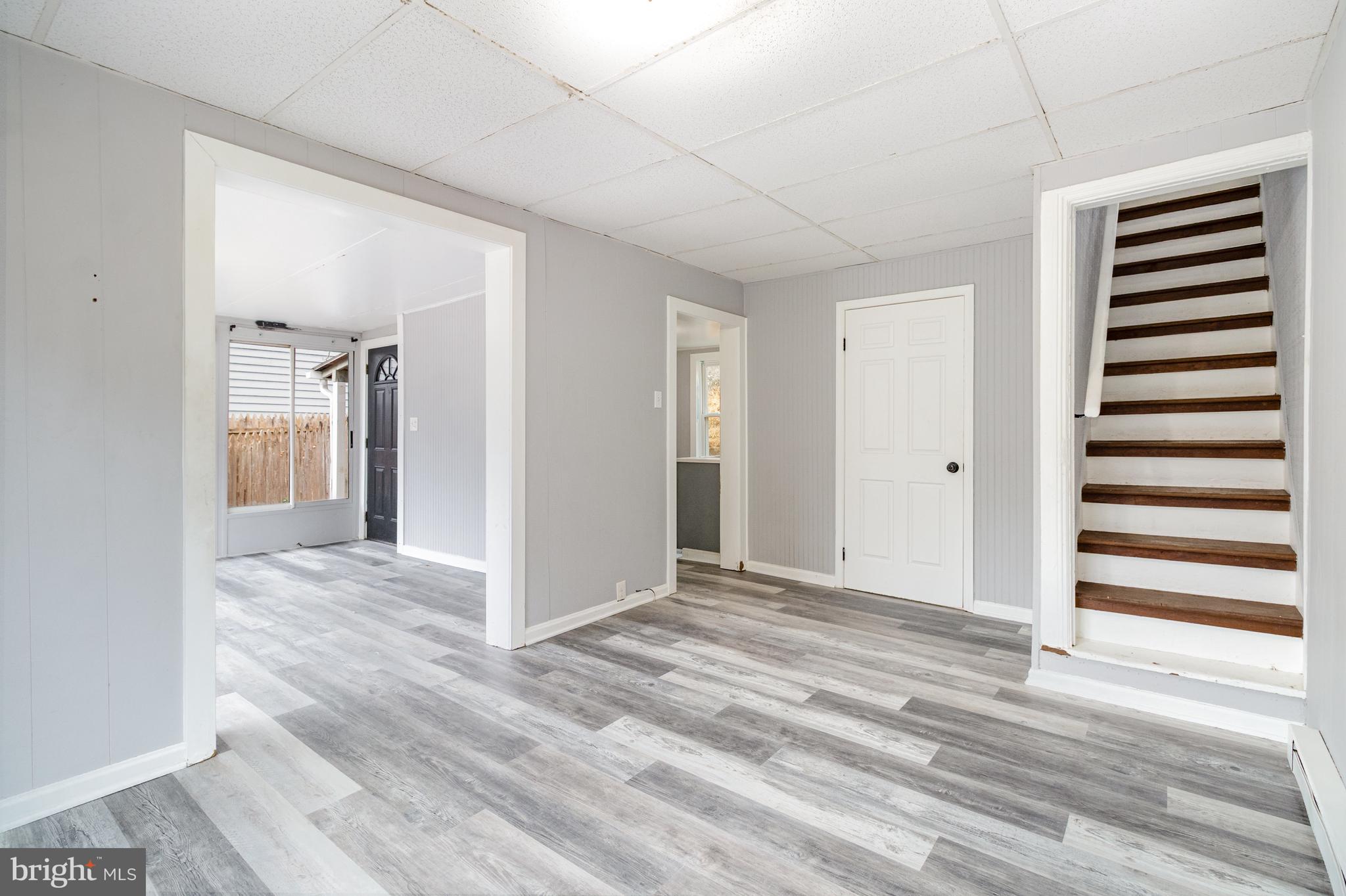 650 Mohn Street Harrisburg, PA 17113 - Photo 5 of 29 a view of a livingroom with wooden floor and closet