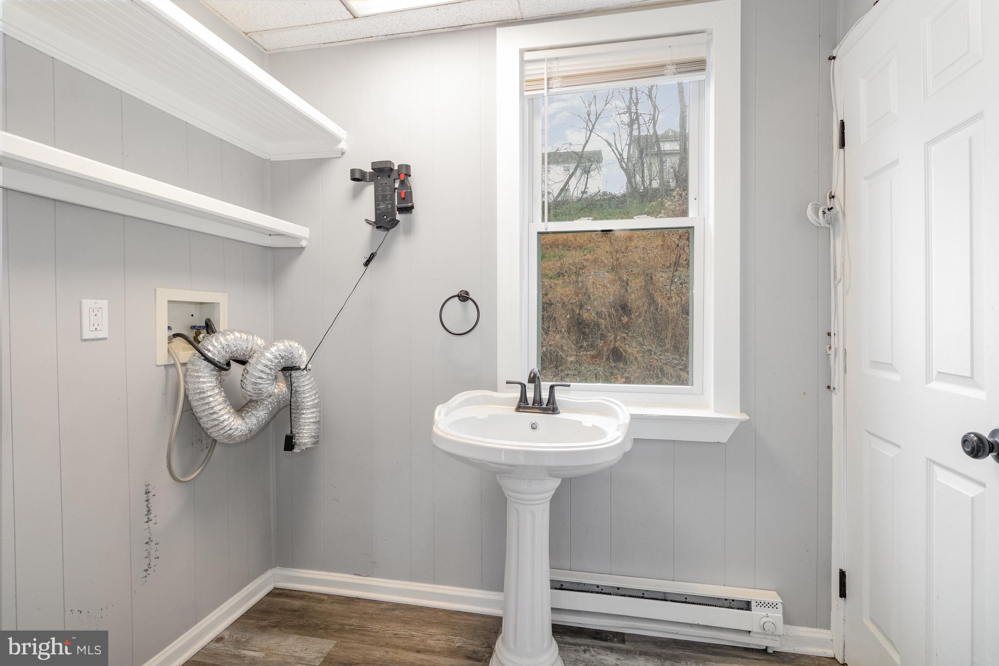 650 Mohn Street Harrisburg, PA 17113 - Photo 10 of 29 a bathroom with a sink and mirror
