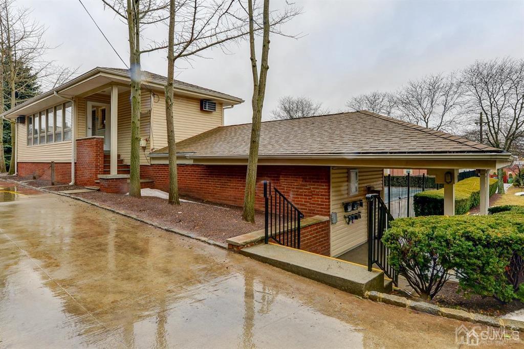 6 York Drive, Unit 5A Edison, NJ 08817 - Photo 13 of 18 a view of a house with a patio