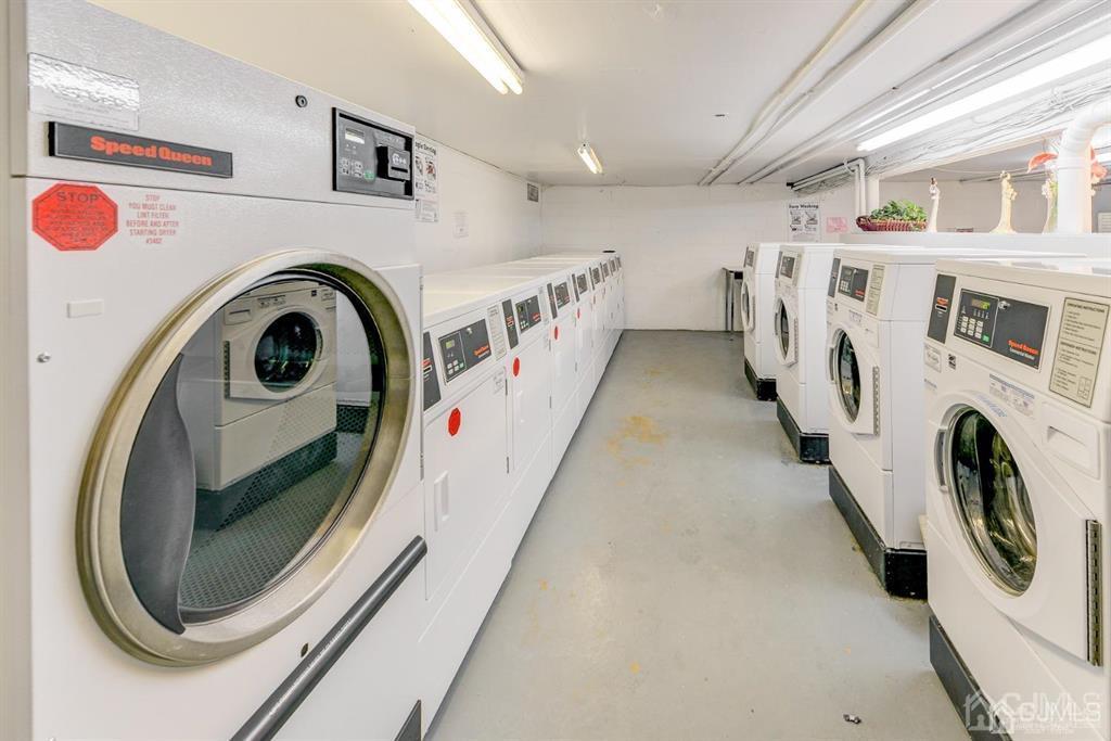 6 York Drive, Unit 5A Edison, NJ 08817 - Photo 16 of 18 a utility room with dryer and washer