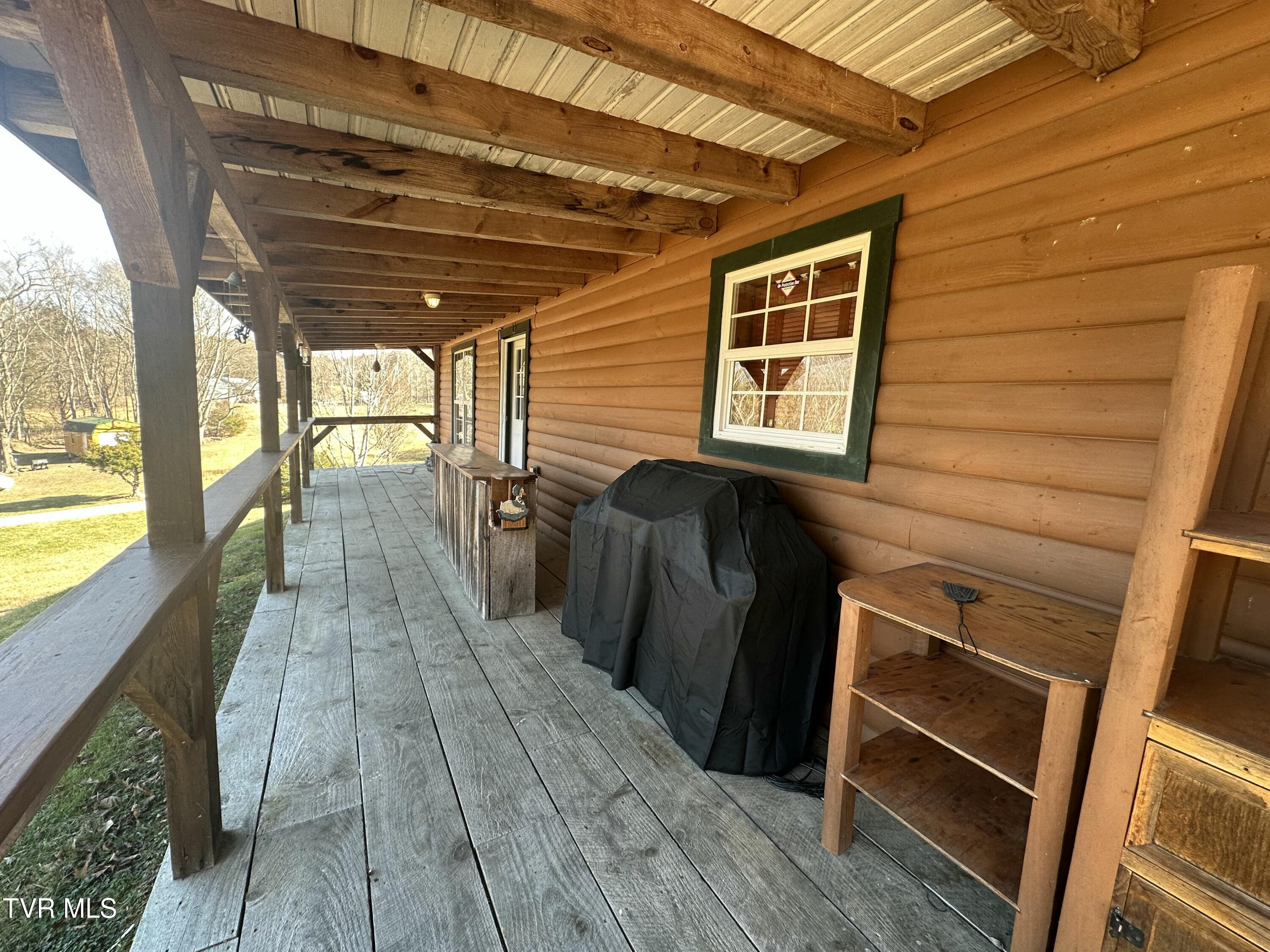 3693 Sane Road Parrottsville, TN 37843 - Photo 17 of 39 3695 front porch
