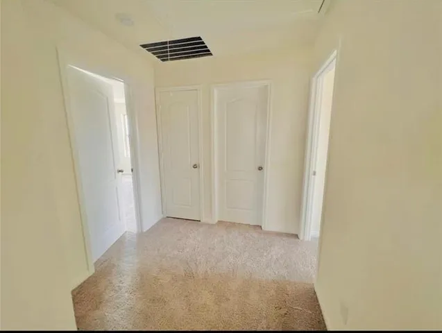 a view of room with window and hardwood